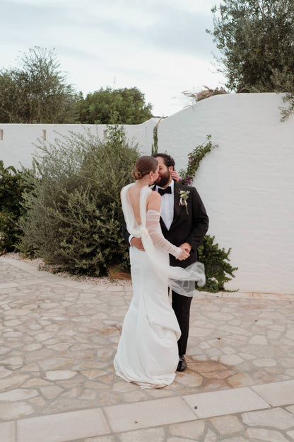 silk tulle bridal scarf tied in back with rusched sheer sleeves